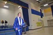 Graduate walking off the stage