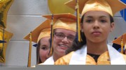 Graduates Smiling Up Close