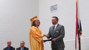 Graduate receiving diploma