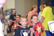 Kindergarten Graduates holding their stars