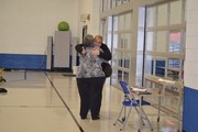 Mrs. Durgin and Renee share a hug