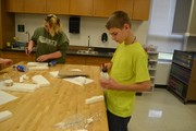 Students making boats