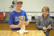 Students making boats