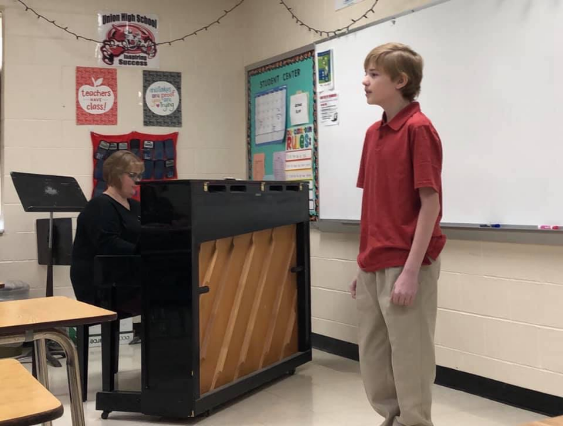 student singing at music festival