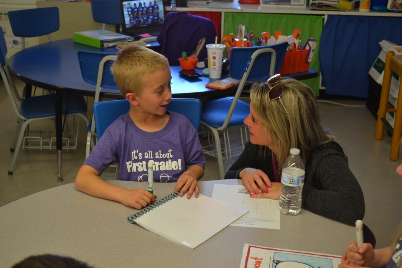 Student authors showing off their work.