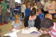 Student authors showing off their work.